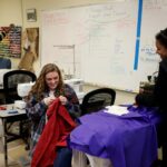 Savannah Cathers, right, and Aylssa Eblen work on costumes for a production of "Monstrous Regiment" in the Ƶ Costume Shop by the Gainesville Theatre Alliance, a partnership between Ƶ and the University of North Georgia. (AJ Reynolds/Ƶ)